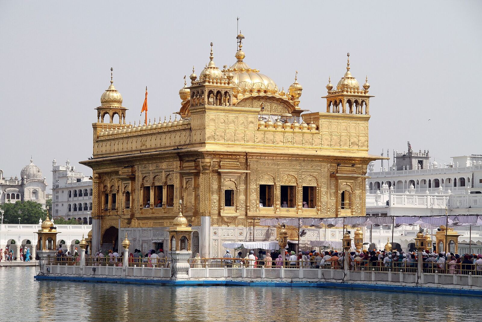 Golden Temple | Sikh Saints The Golden Temple, Harmandir Sahib, shines brilliantly in Amritsar, a central place of Sikh faith.